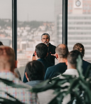 Team members during a presentation