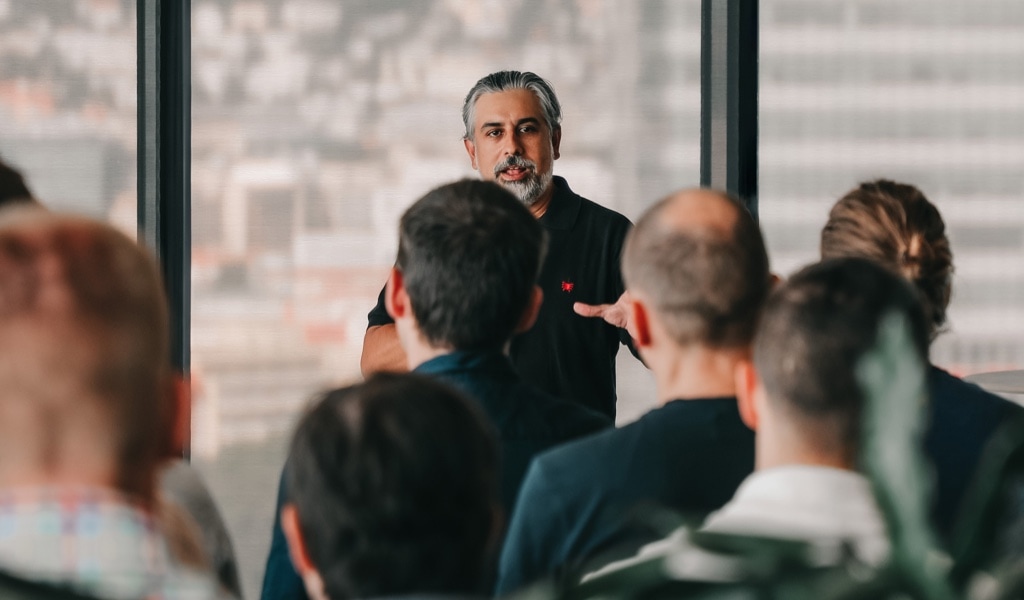 Team members during a presentation