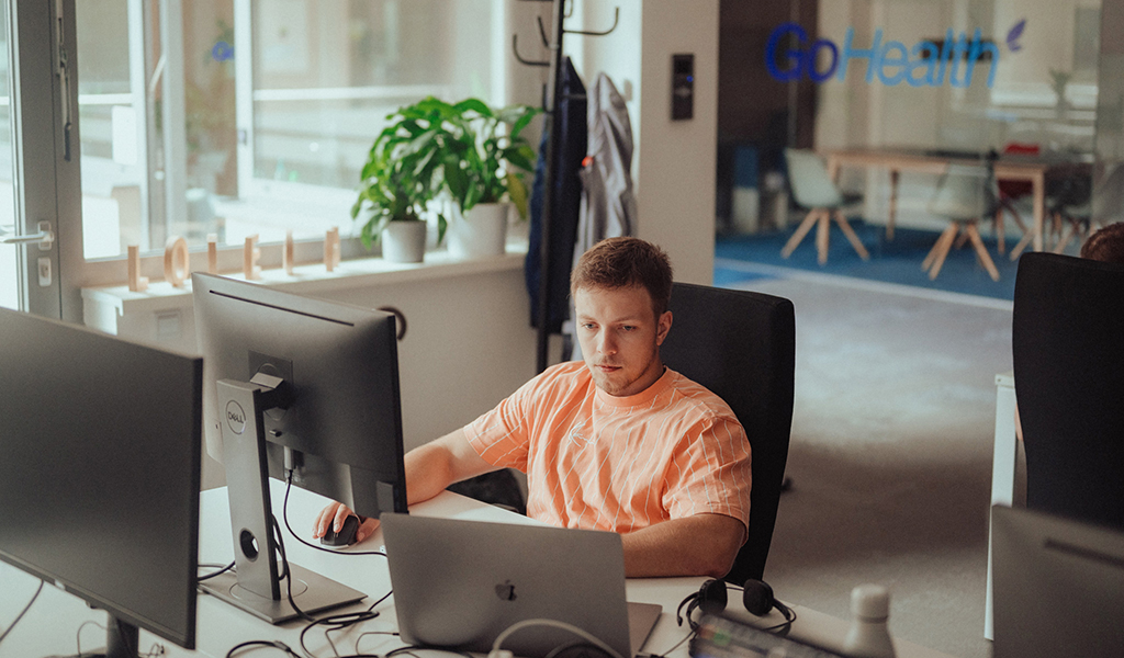 Software Engineer working on his computer