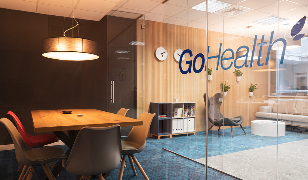 Focus room with GoHealth logo on a glass wall