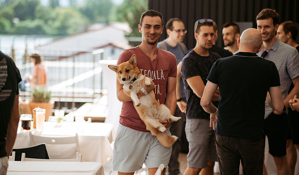 Team members of GoHealth one of them holding a dog