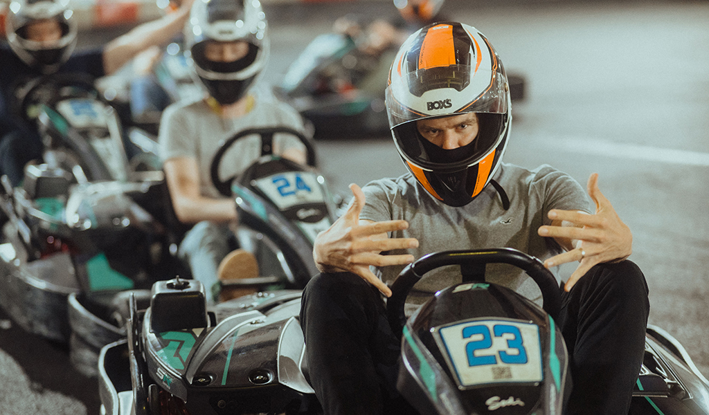 Man in a helmet in a go-kart