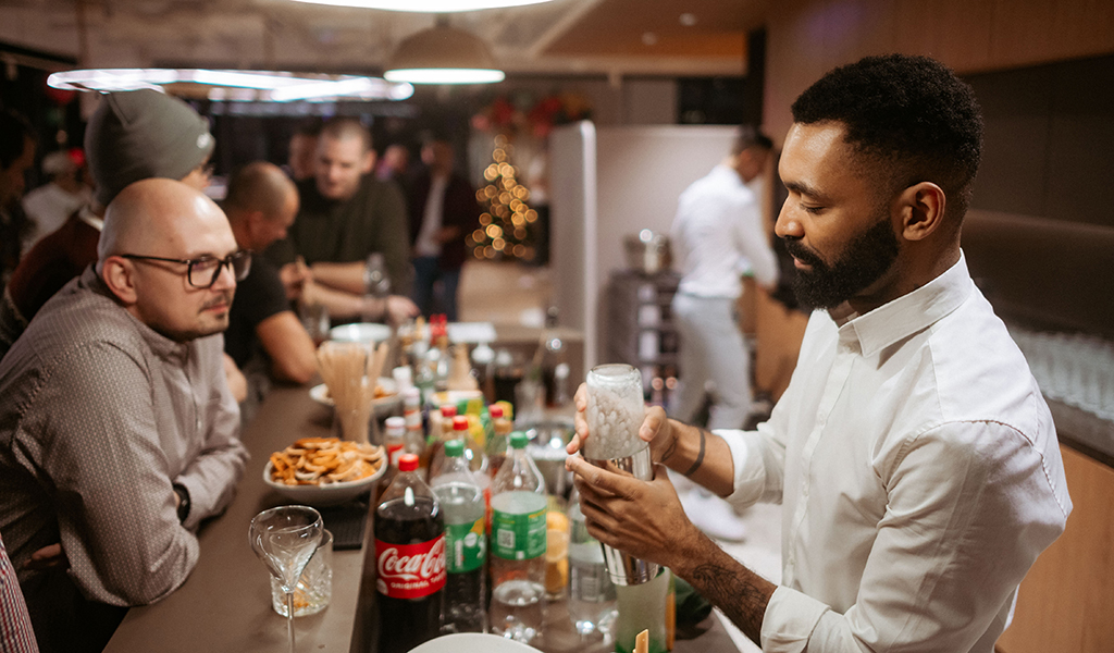 Bar with a bartender during the Christmas party in the office