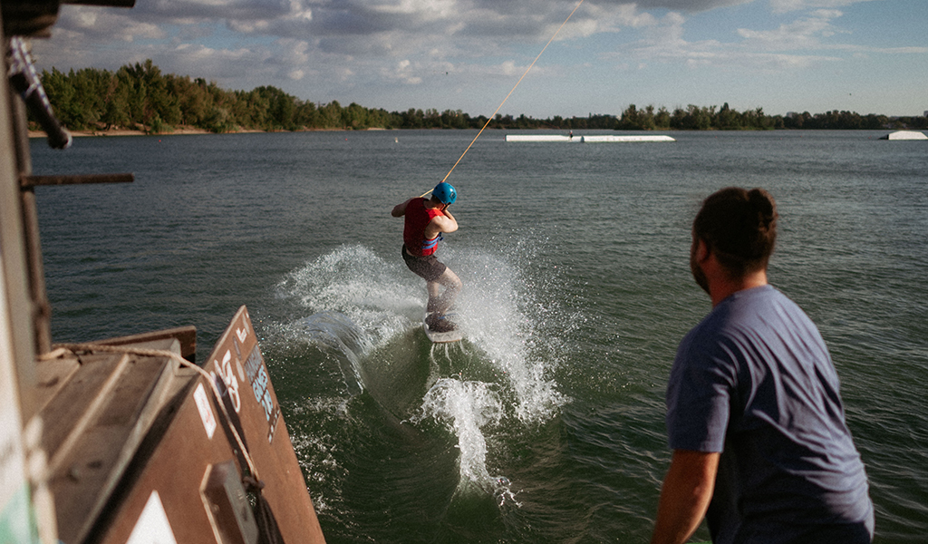 Man on a wakeboard on a lake