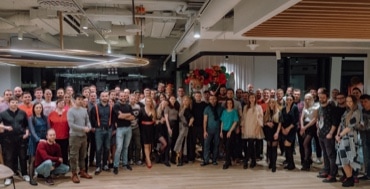 Group photo of team members at Christmas party