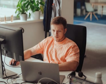 Software Engineer working on his computer