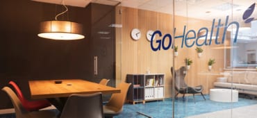 Focus room with GoHealth logo on a glass wall