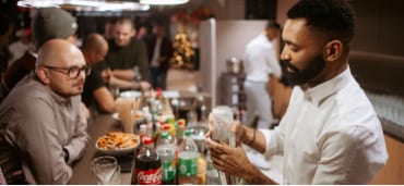 Bar with a bartender during the Christmas party in the office