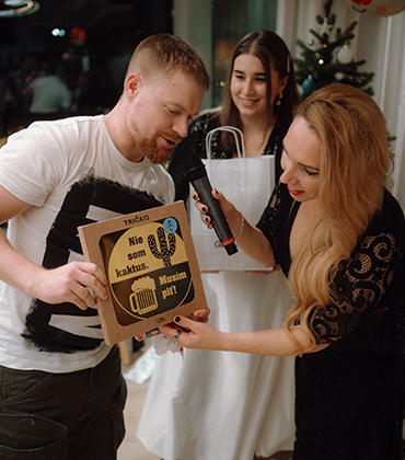 Team members laughing during the Christmas party