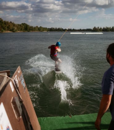 Man on a wakeboard on a lake