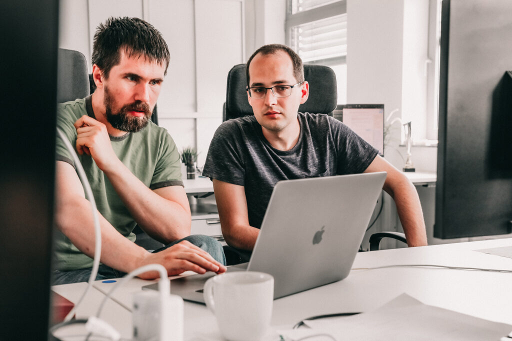 Two Engineers discussing work.