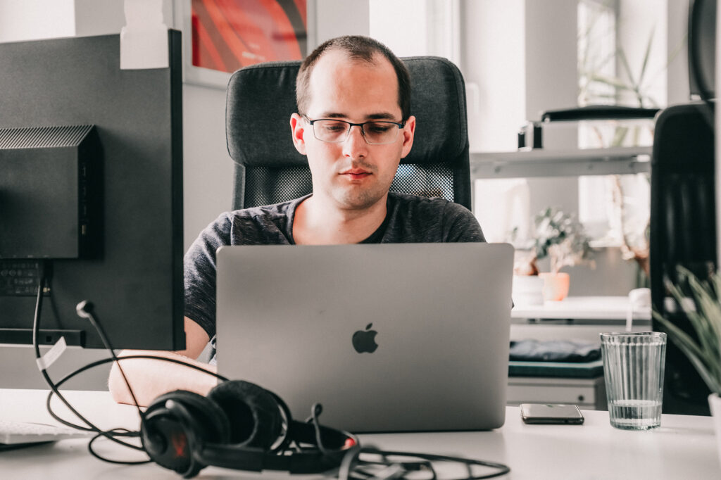 Site Reliability Engineer focusing on his work.