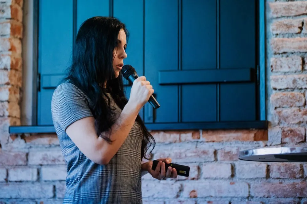 Female Software Engineer giving a presentation.