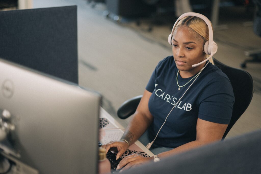 female call center agent working with her headphones on