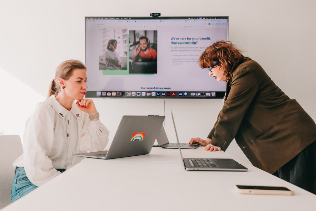 two female project managers suring a meeting