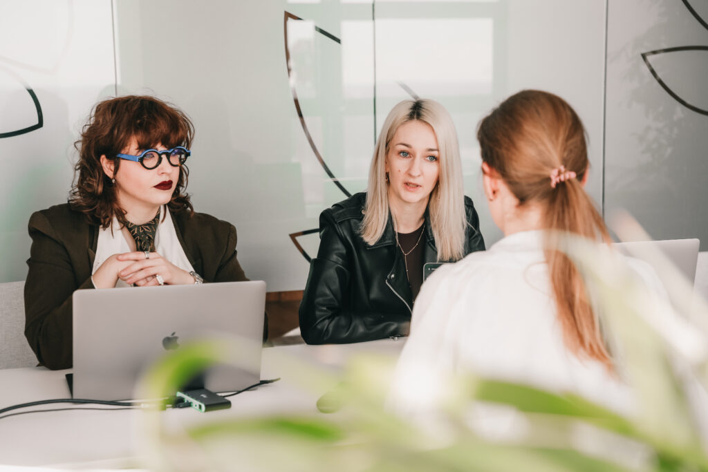 three female project managers during a meeting